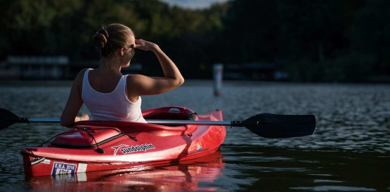 How far can a kayak hang out of a trailer